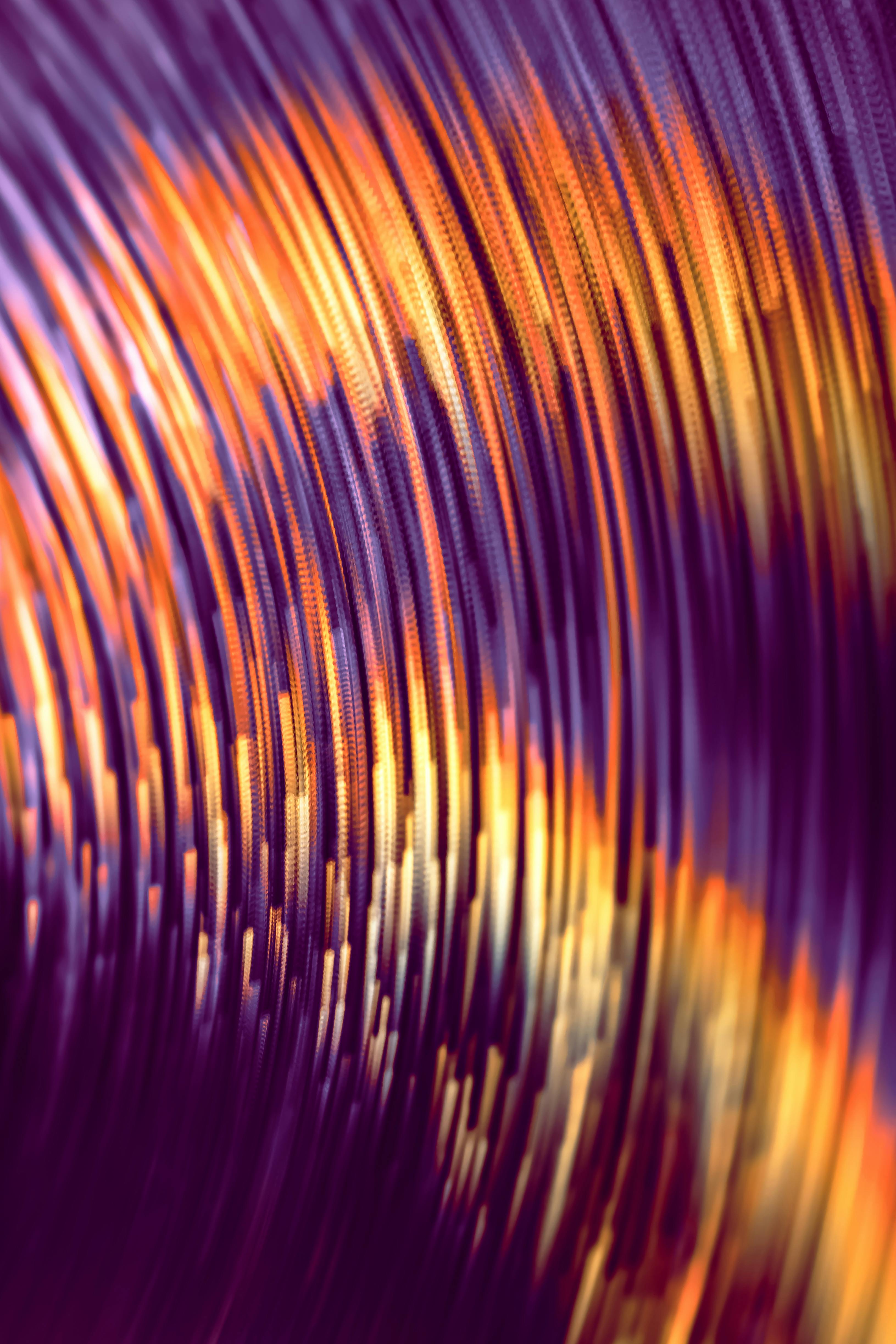Dynamic abstract image with vibrant waves and bold colors creating a futuristic visual experience.