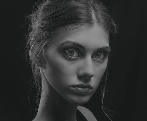 Woman's Face in Close Up Photography