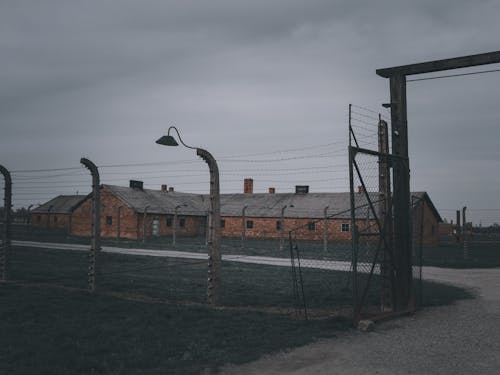 A Brick Building under a Gloomy Sky