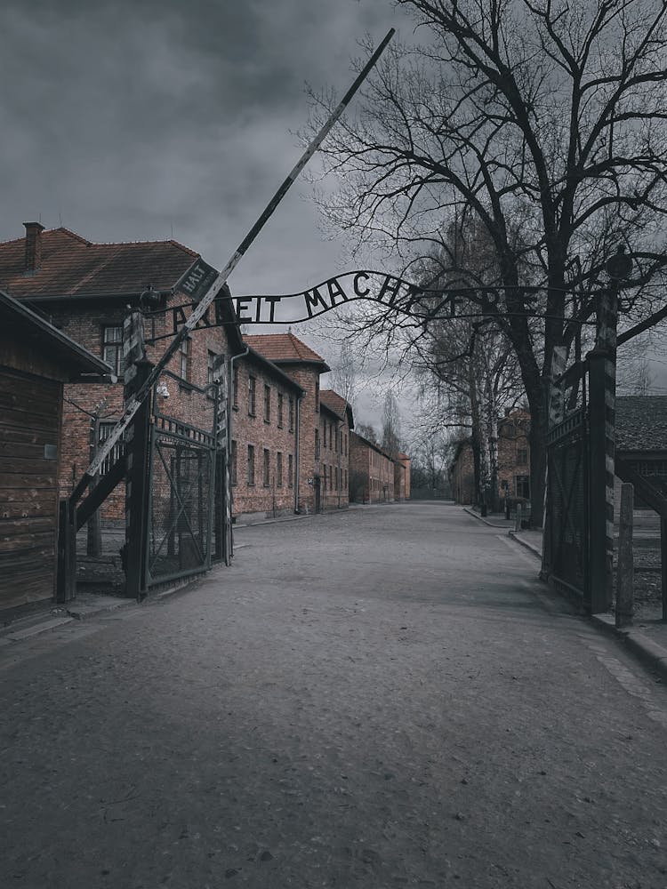 Gate With Arbeit Macht Frei Sign To The German Nazi Concentration Camp, Auschwitz, Poland