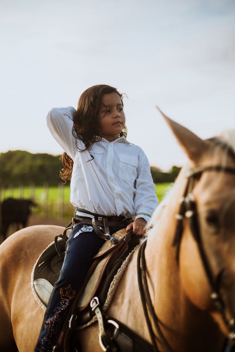 Little Girl Riding Horse