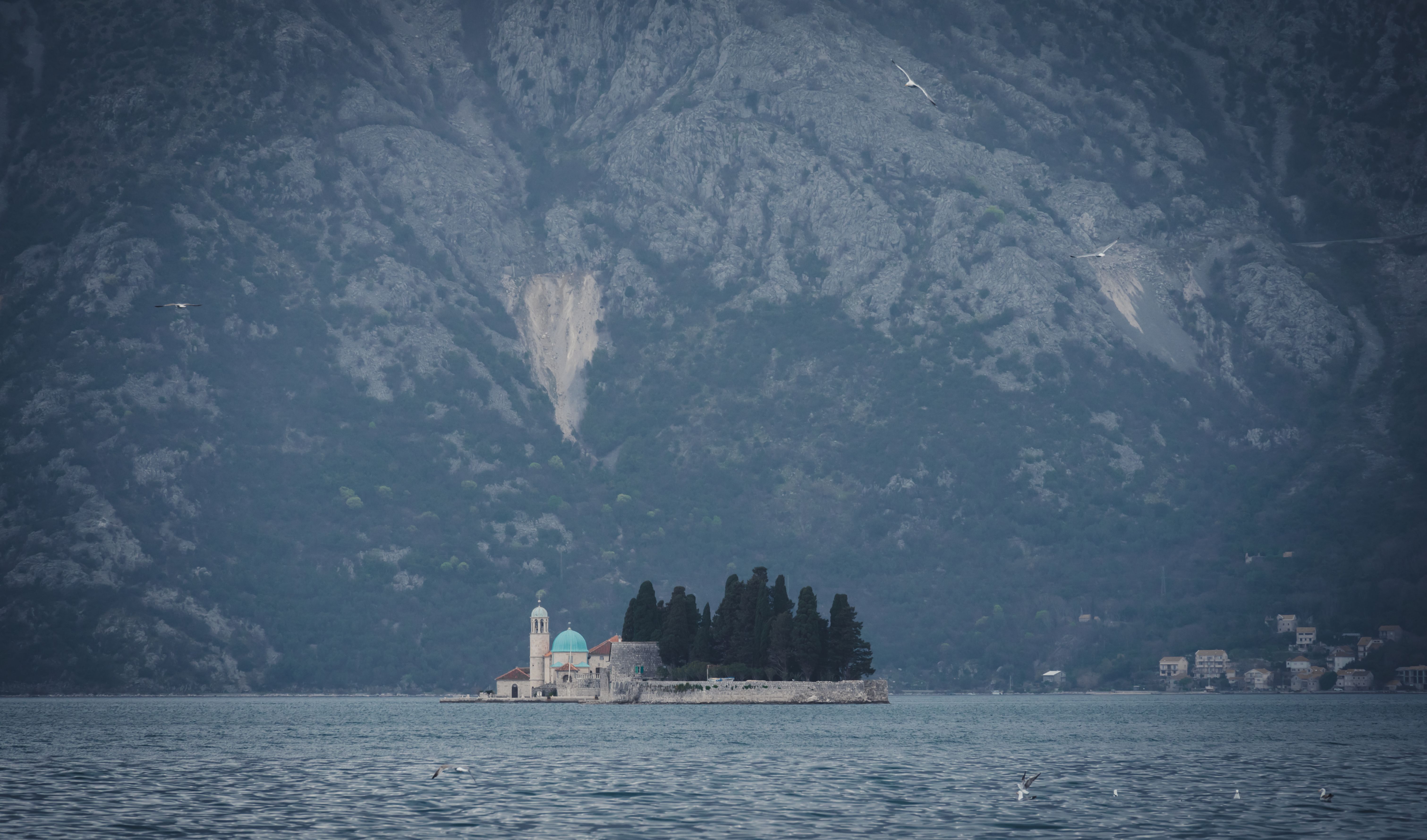 Perast Montenegro bay sunset with stone church island