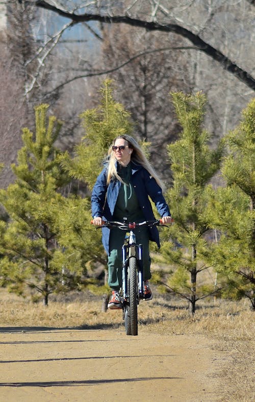 Free Woman Riding a Bicycle Stock Photo