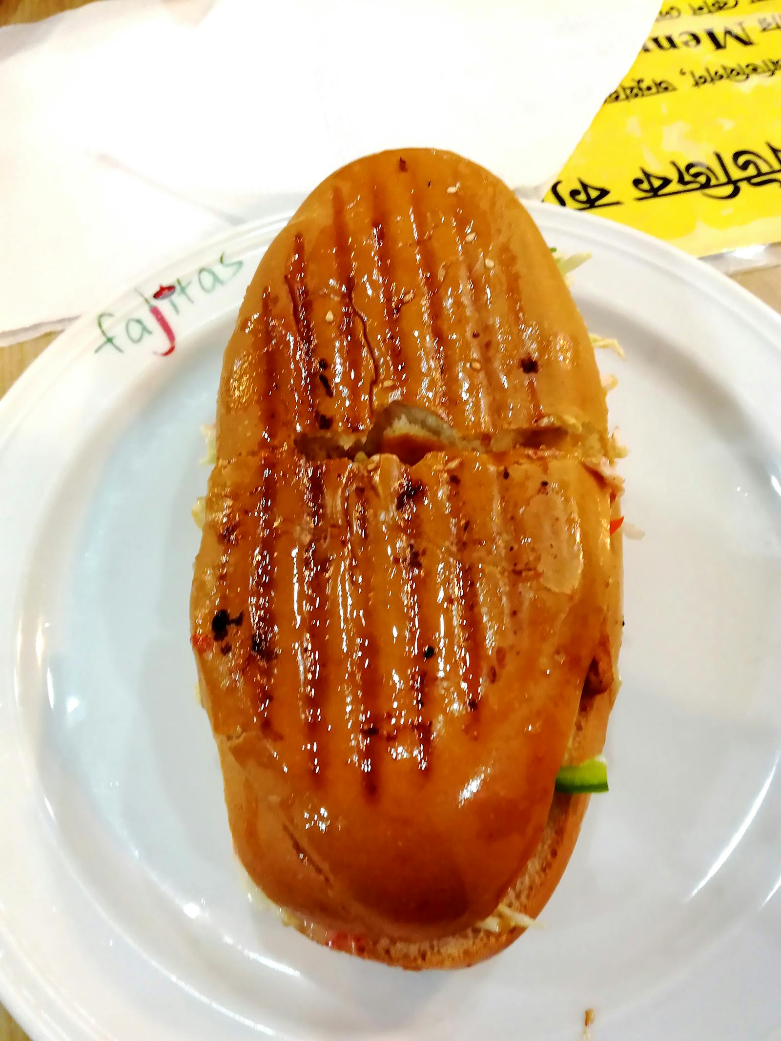 Person browsing music playlists on a smartphone