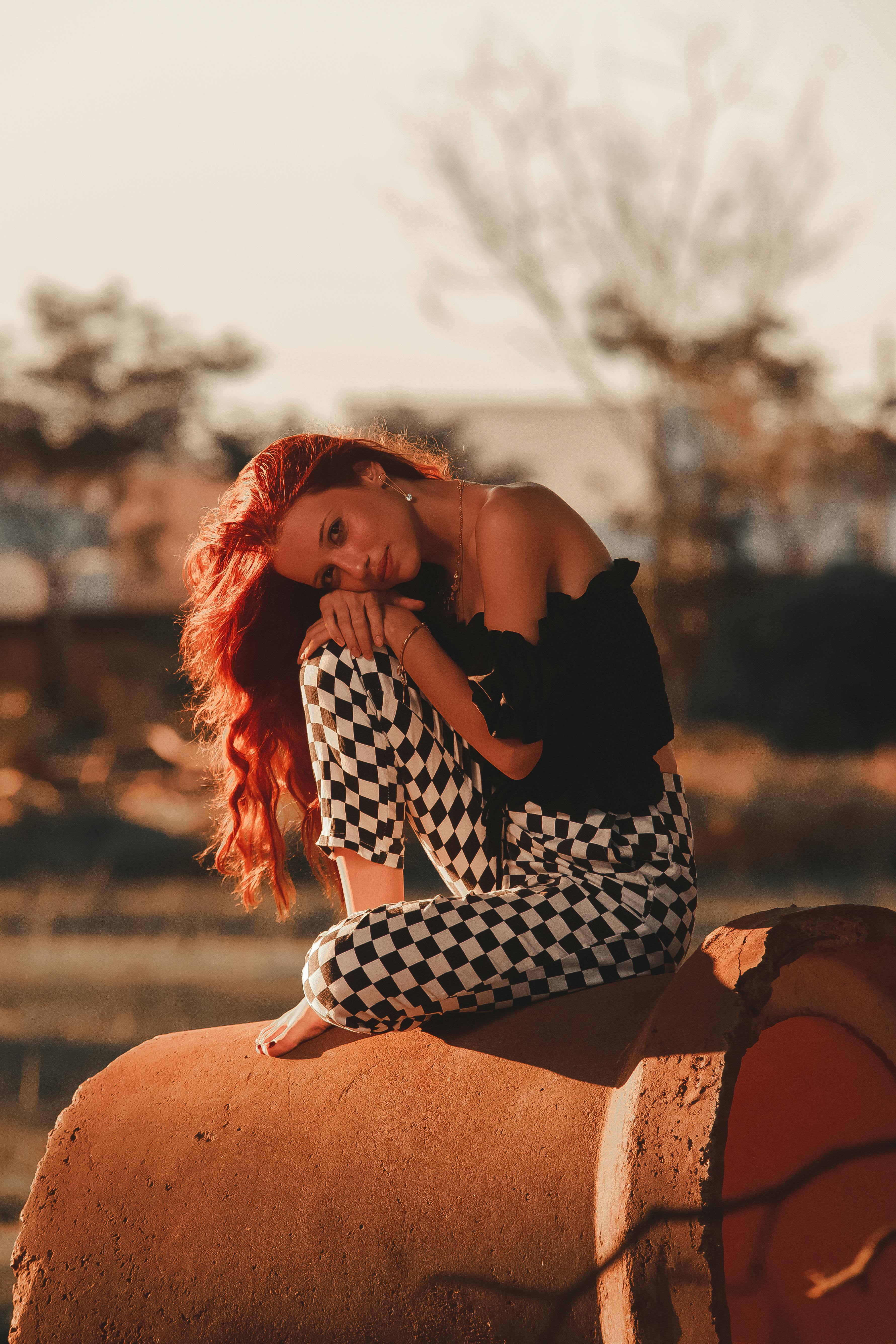 Free Photo  African american woman in red pants and white fur