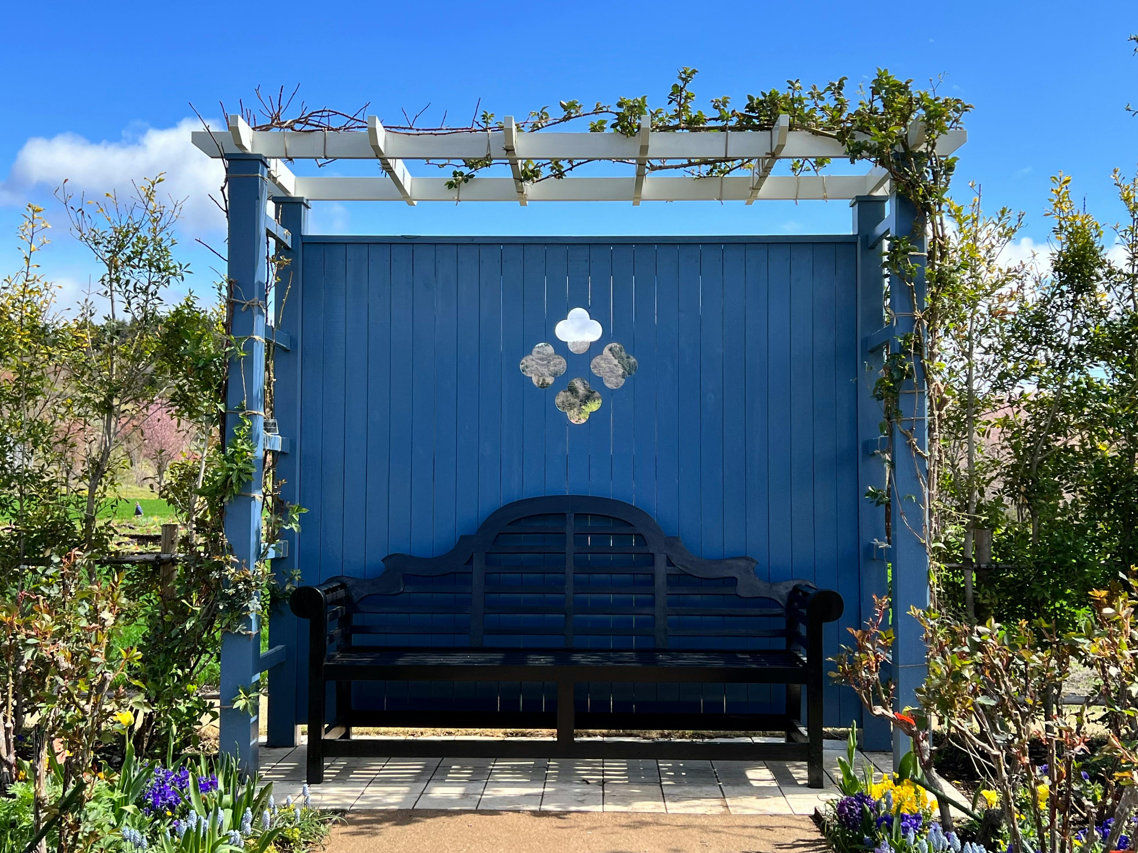 Modern 4m x 3m pergola with a bronze polycarbonate roof and integrated LED lighting at sunset - 4m x 3m pergola kit