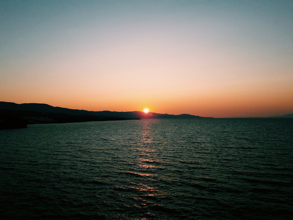 Silhouette of Mountain during Sunset