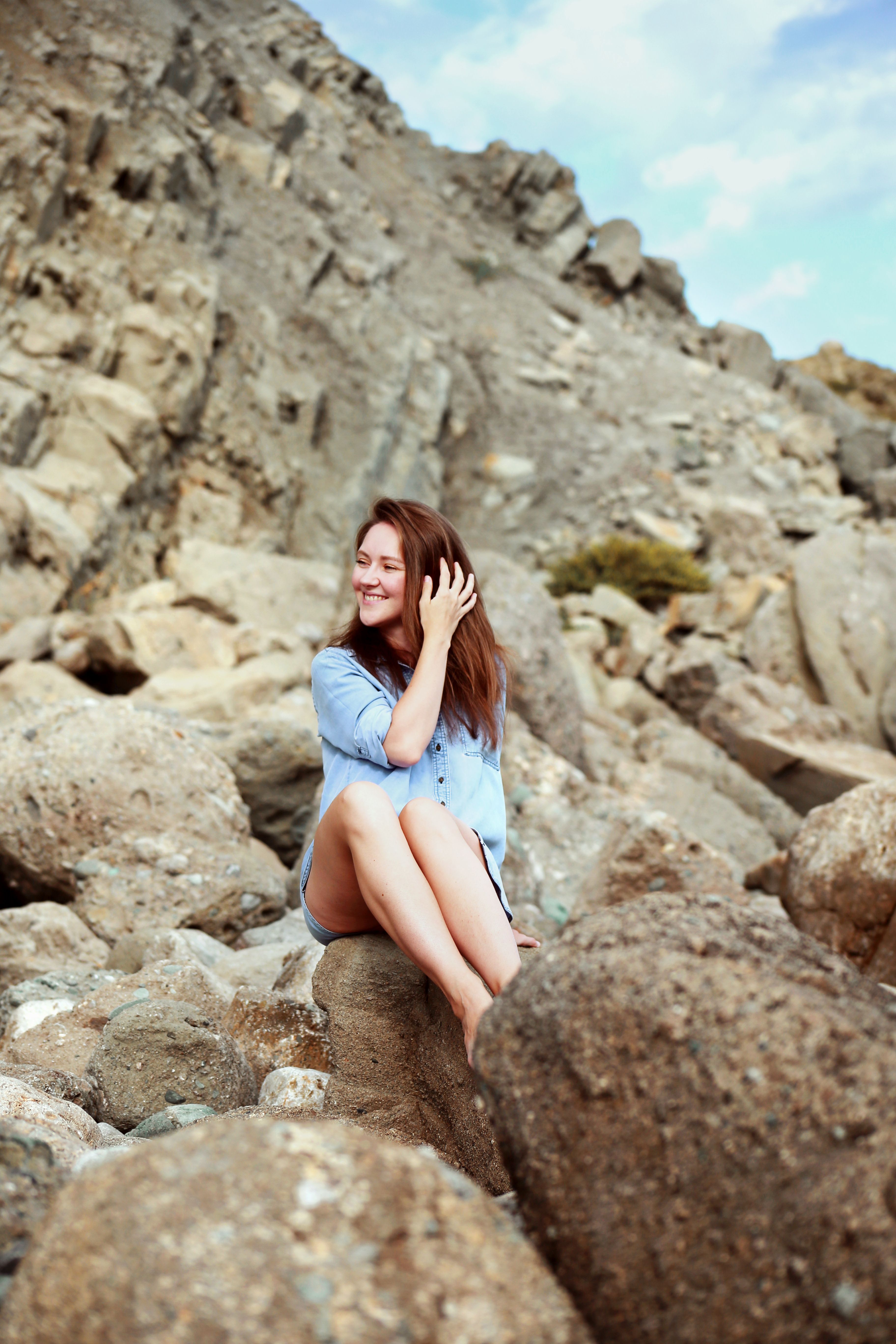 Woman Sitting on the Rock · Free Stock Photo