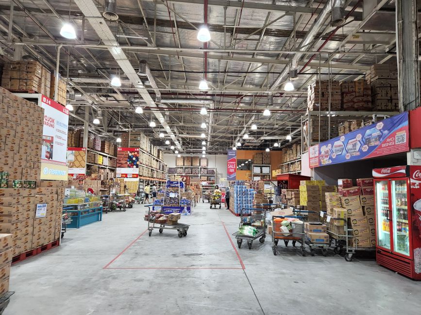 warehouse store interior with bulk shelving for buying in bulk