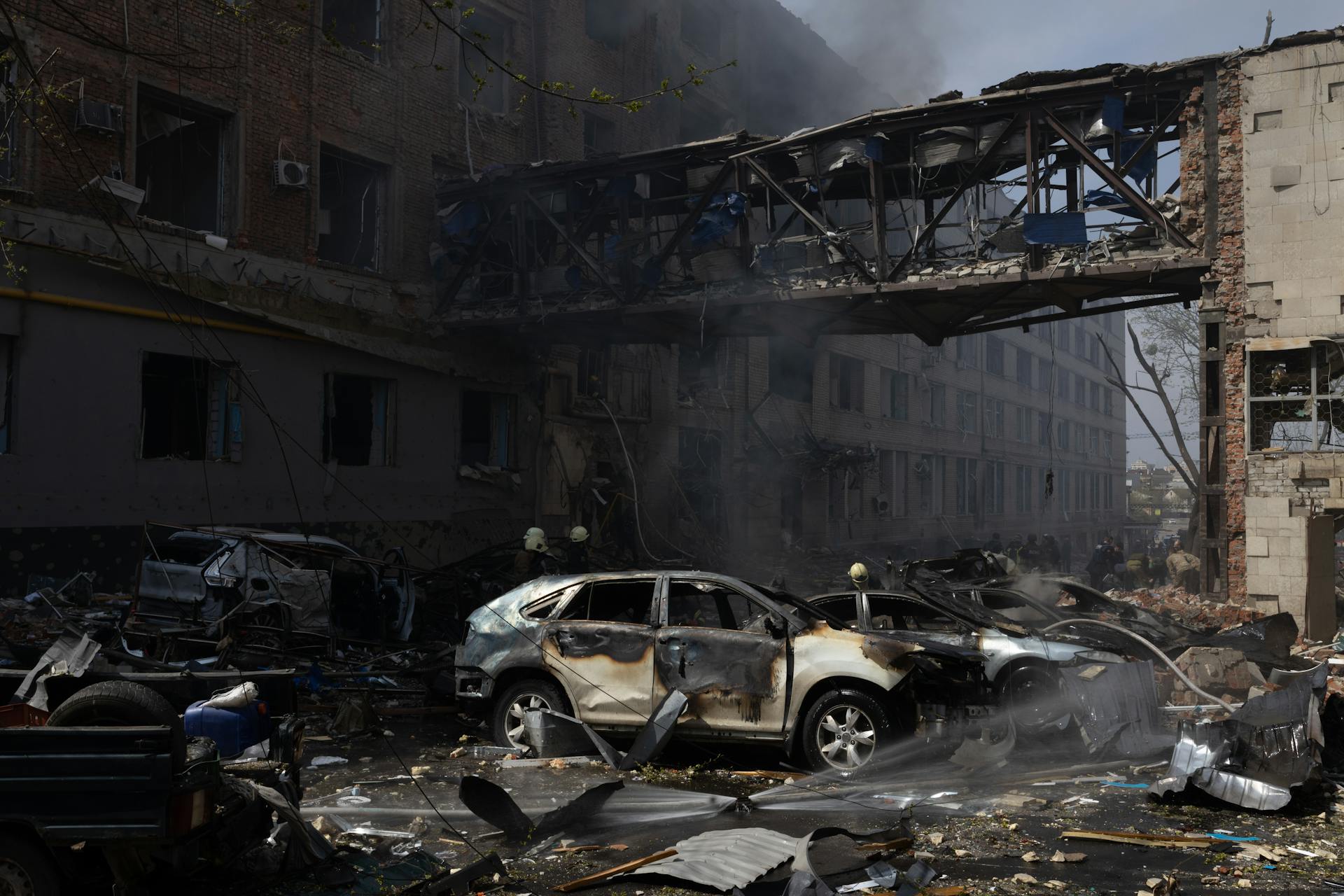 Building and Car Damaged by Fire