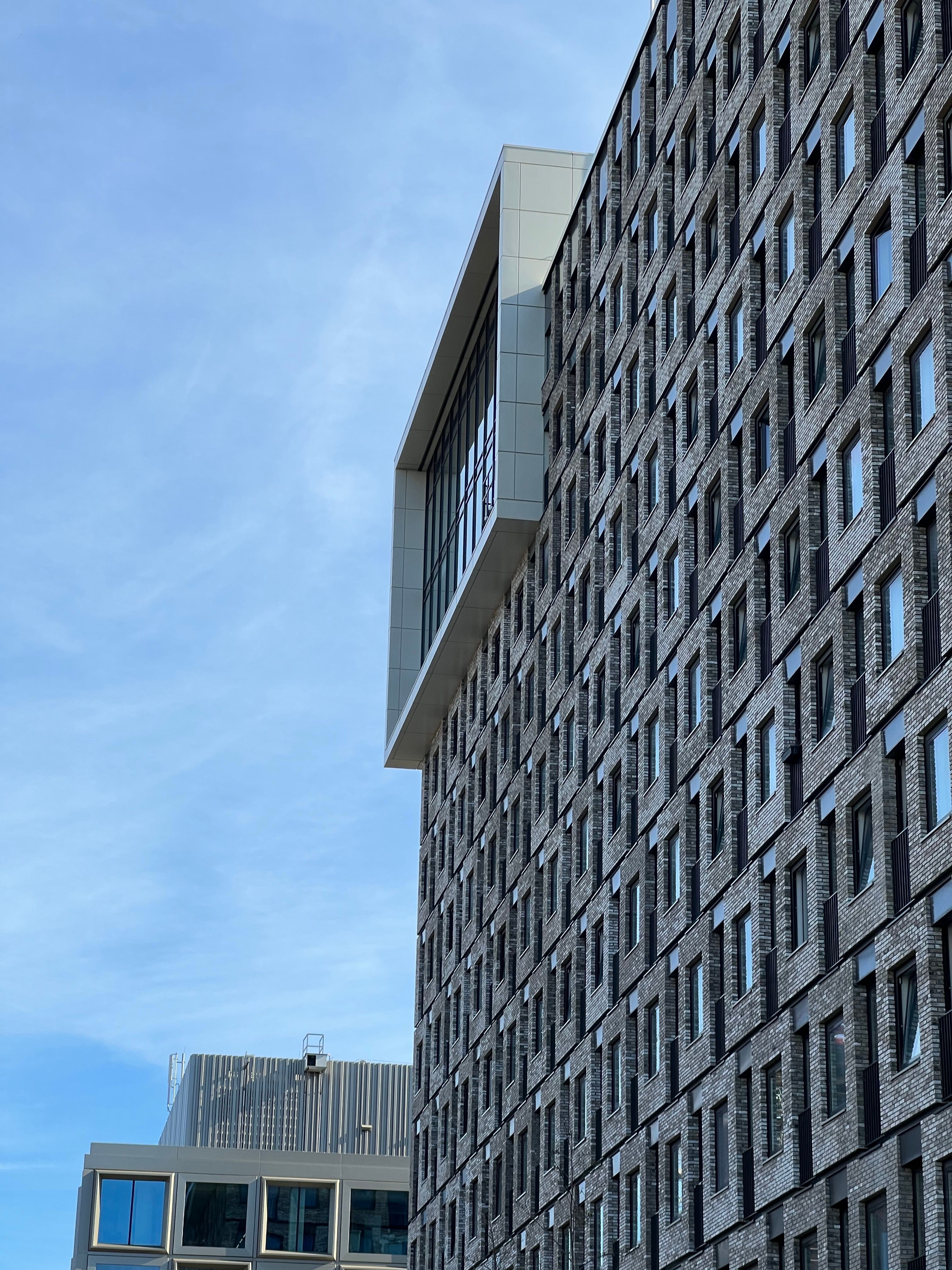Gray Concrete Building Under the Blue Sky · Free Stock Photo