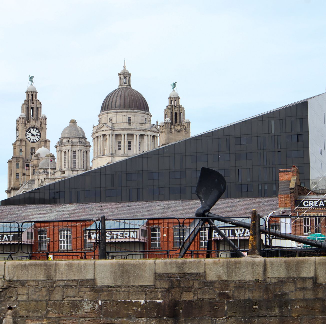 Iconic view of historic Liverpool architecture with classic and modern elements.