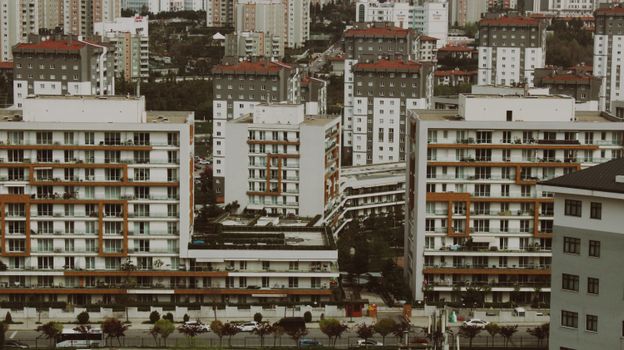Explore the intricate architecture and layout of Istanbul's urban landscape with modern high-rise buildings.