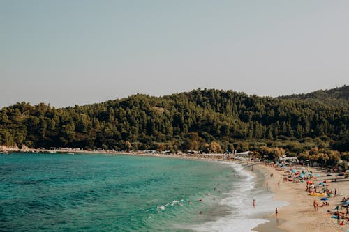 Fotobanka s bezplatnými fotkami na tému biely piesok, exteriéry, ľudia