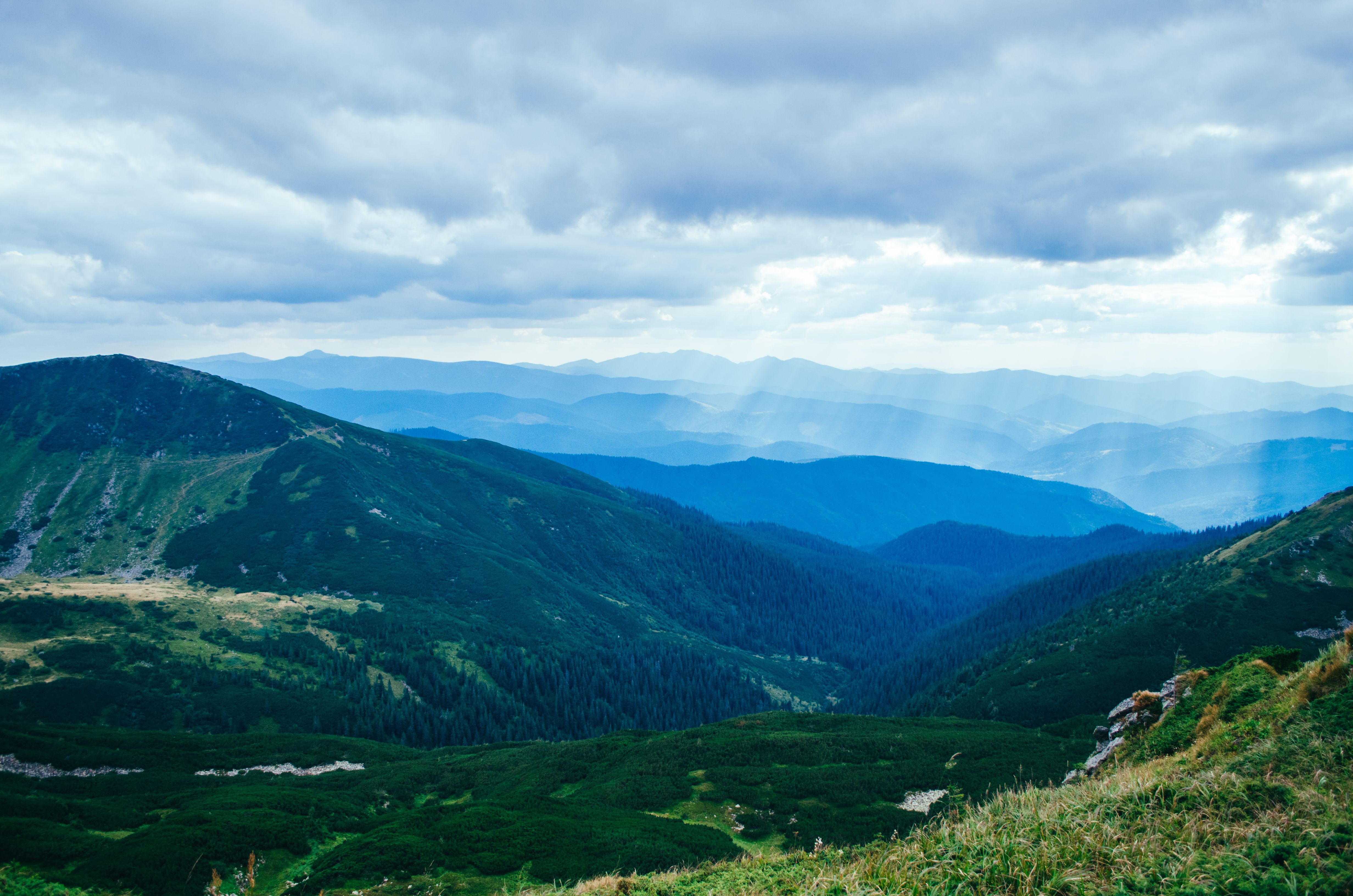 Green Mountains Under White Clouds · Free Stock Photo