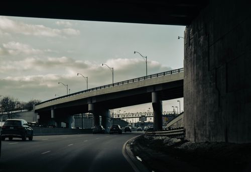 Free View of a highway overpass and traffic in Toronto, Canada, showcasing urban infrastructure. Stock Photo