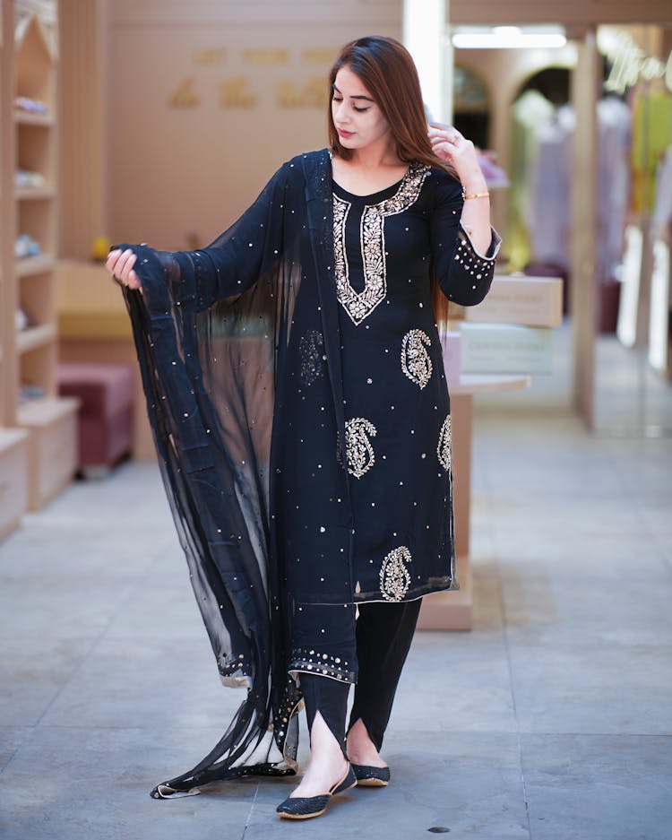 A Woman In Black Saree Dress