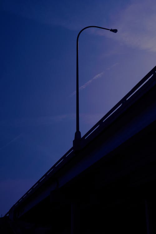 Silhouette of Light Post on the Bridge