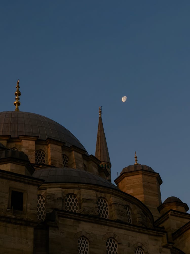 Moon In The Blue Sky Over The New Mosque