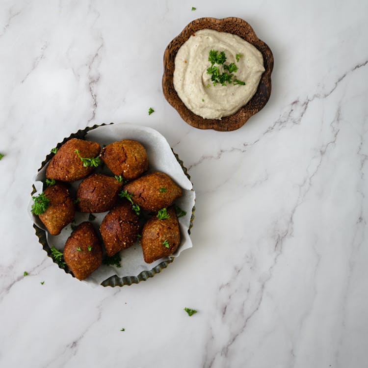 Fried Kibbeh On Plate With Sauce On Bowl