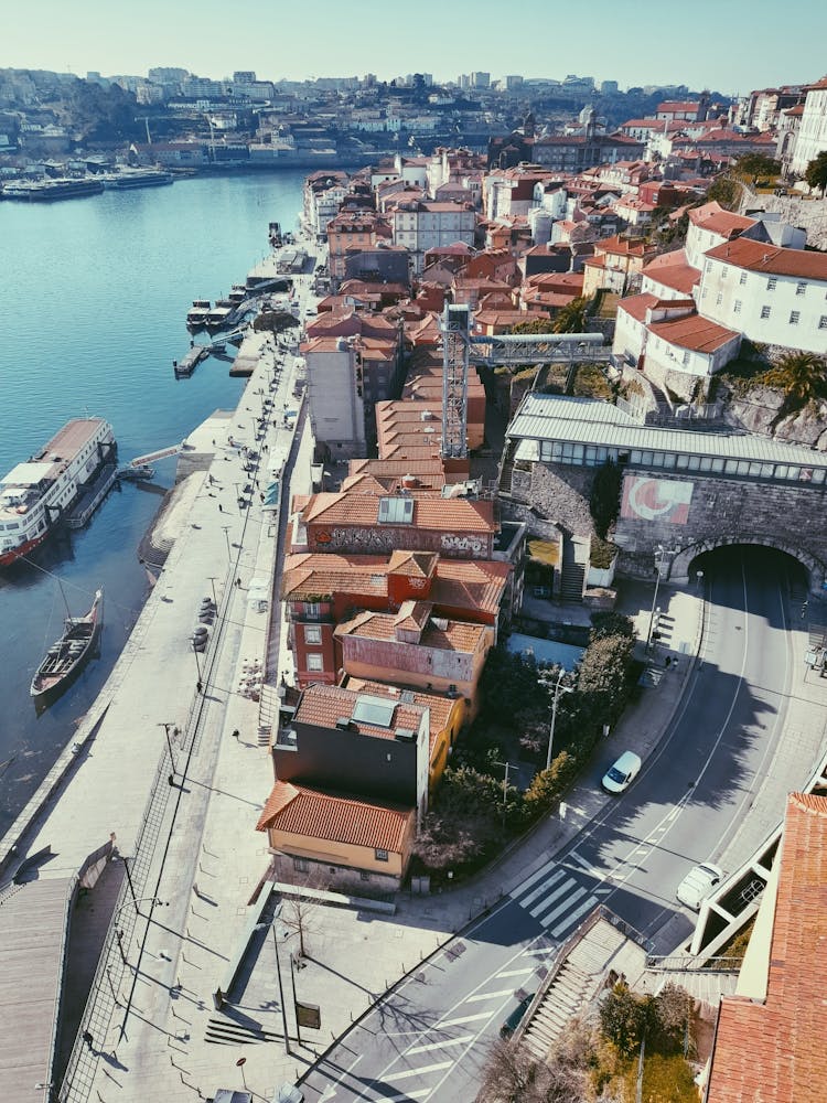 Aerial View Of A Port Near City Buildings 