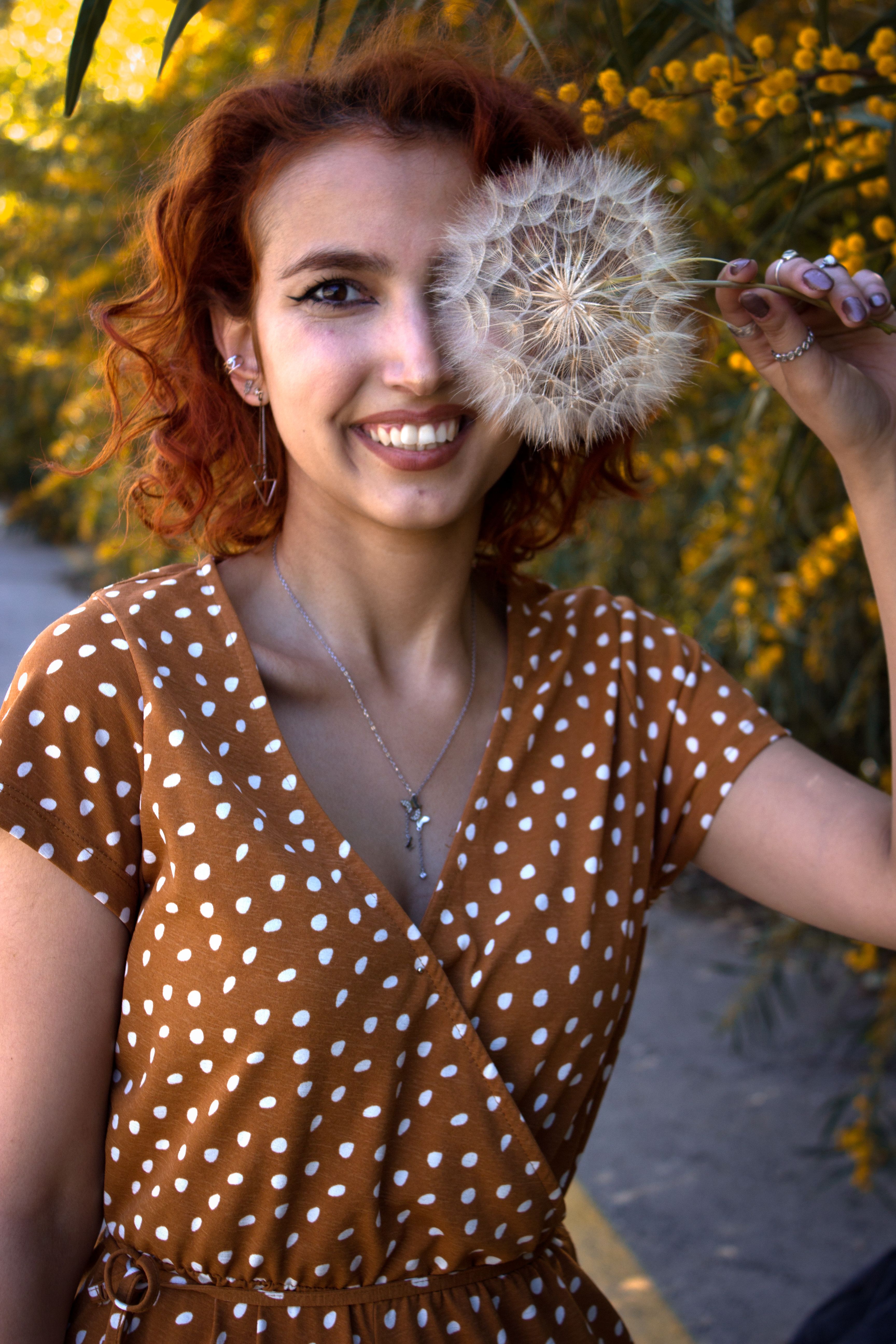 Woman in Brown and White Polka Dots · Free Stock Photo