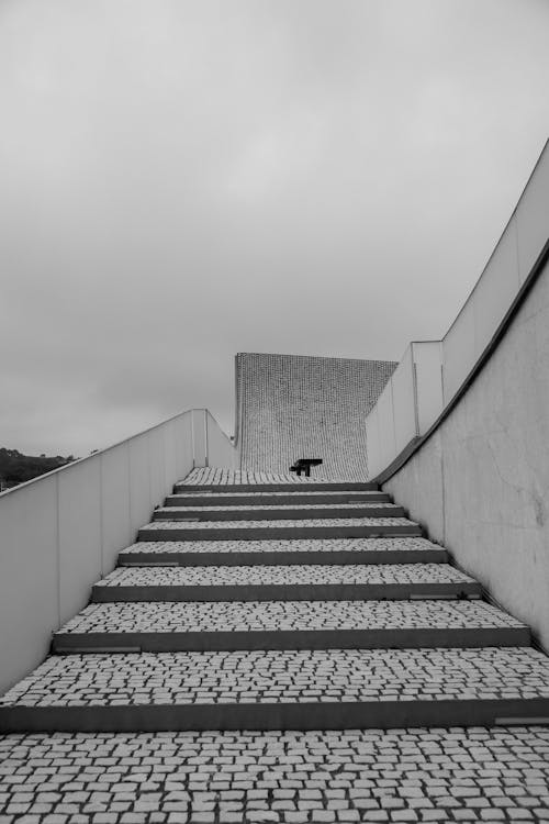 Grayscale Photo of Staircase