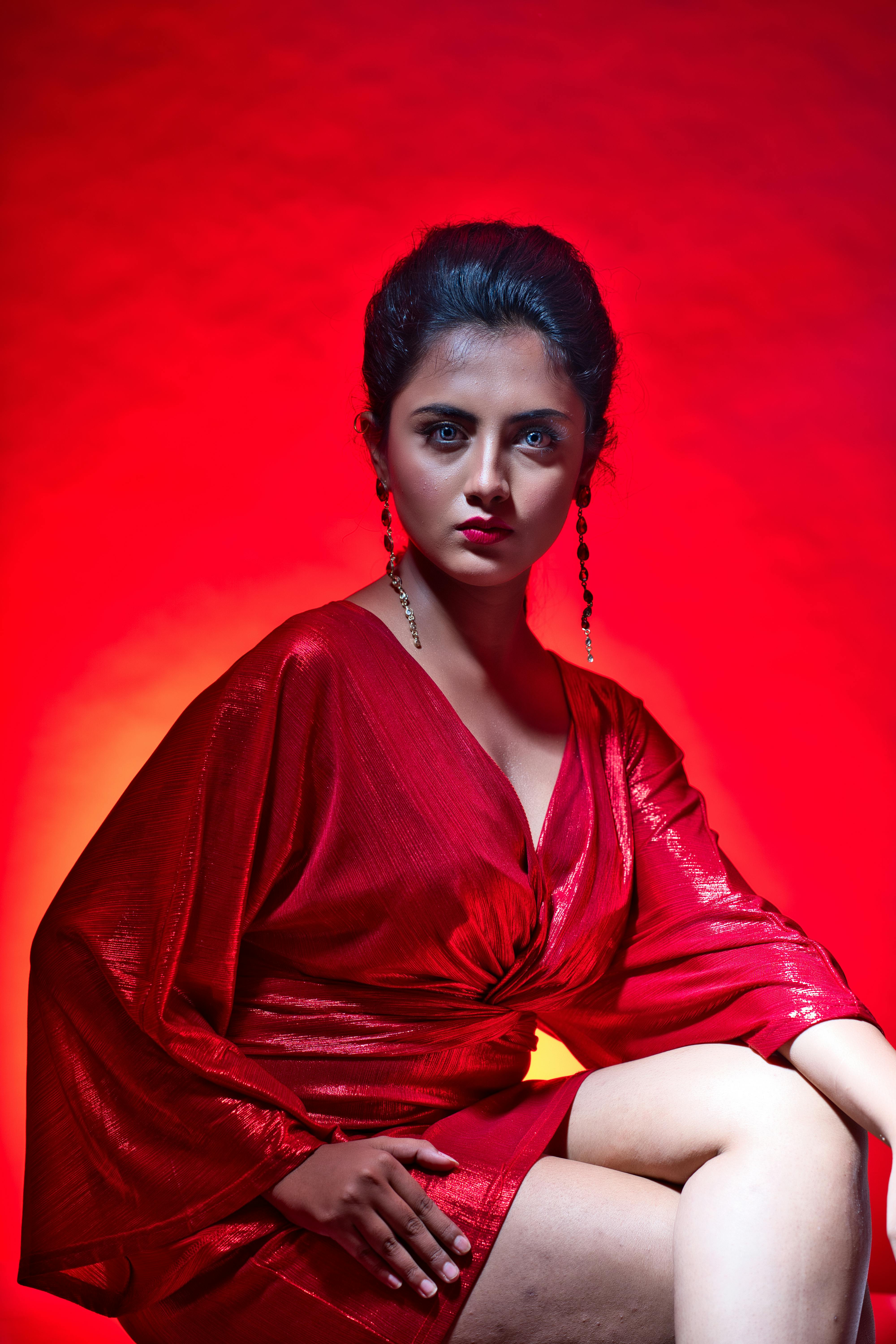 Woman wearing Red Dress with Red Background  Free Stock Photo