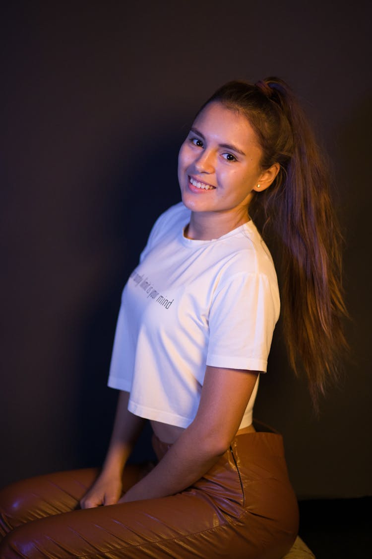 Studio Shot Of Woman In Tshirt And Pants