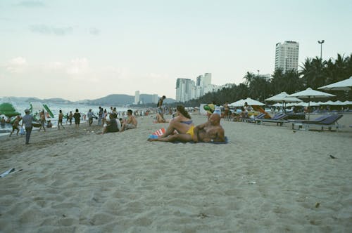 Free People on Beach Stock Photo