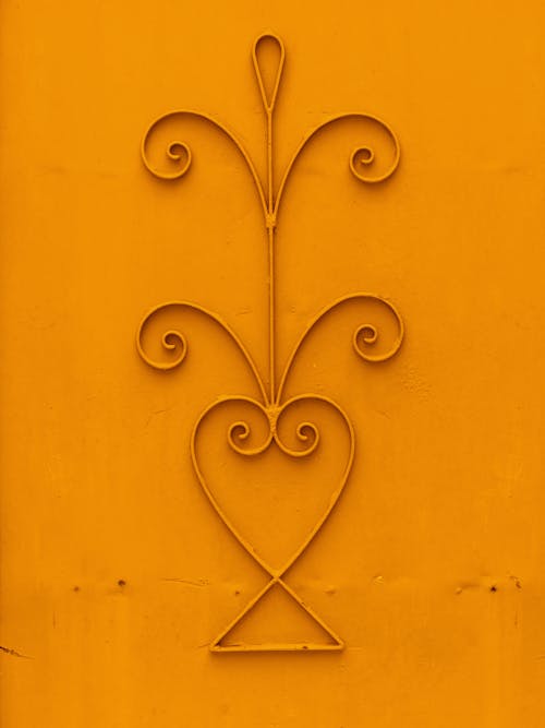 Orange Gate with Wrought Iron Design