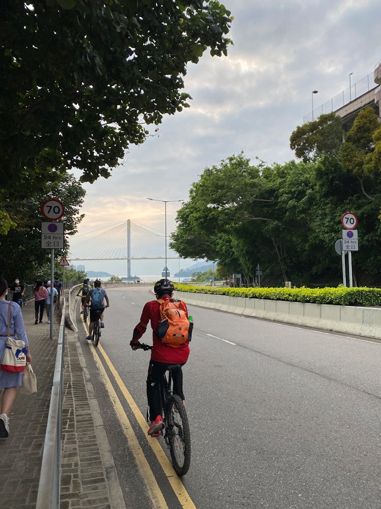 People Cycling On A Street