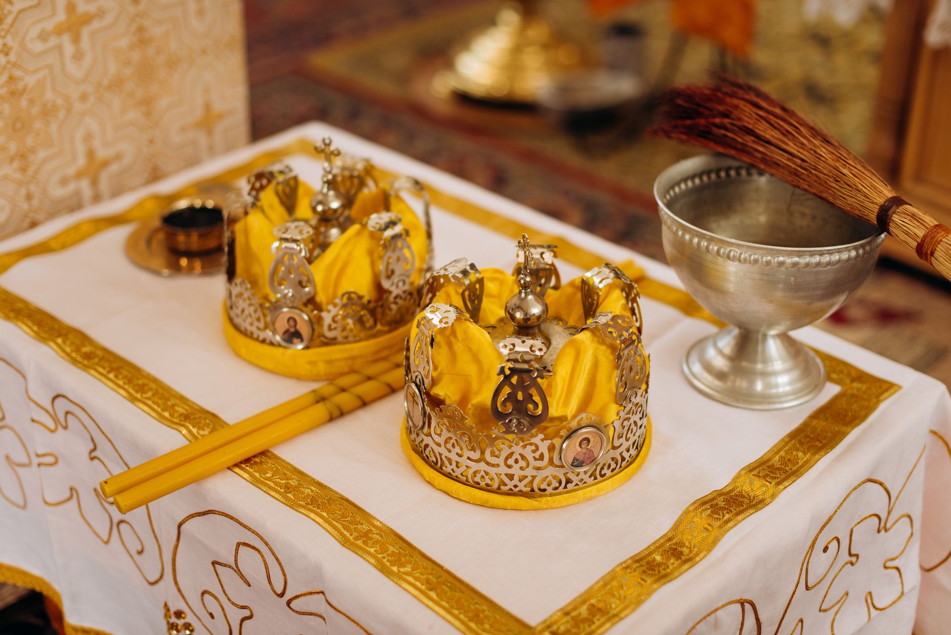 Beautiful display of ornate crowns and religious artifacts for a ceremonial event.