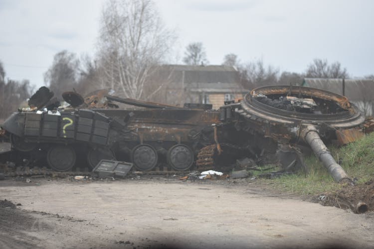 Destroyed Military Vehicle On Side Of The Road