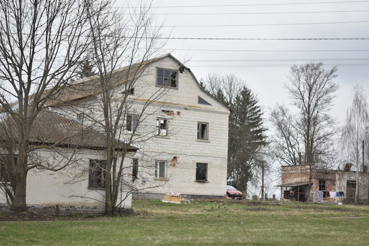 Old Farmhouse Among Trees