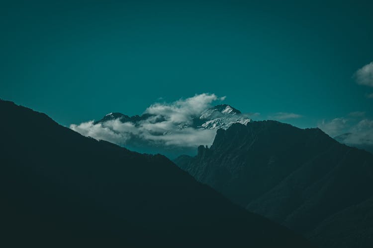 Scenic View Of Clouds Above The Mountains