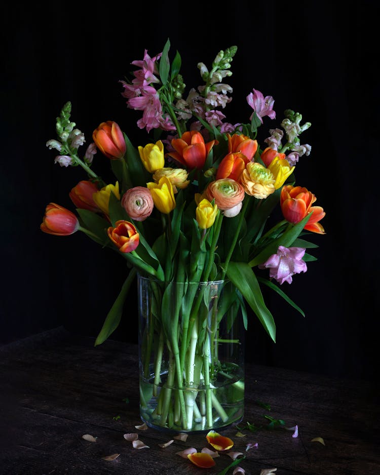 Blooming Flowers On A Clear Vase