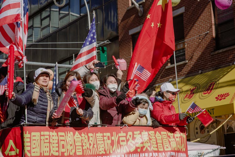 People With Flags On Event