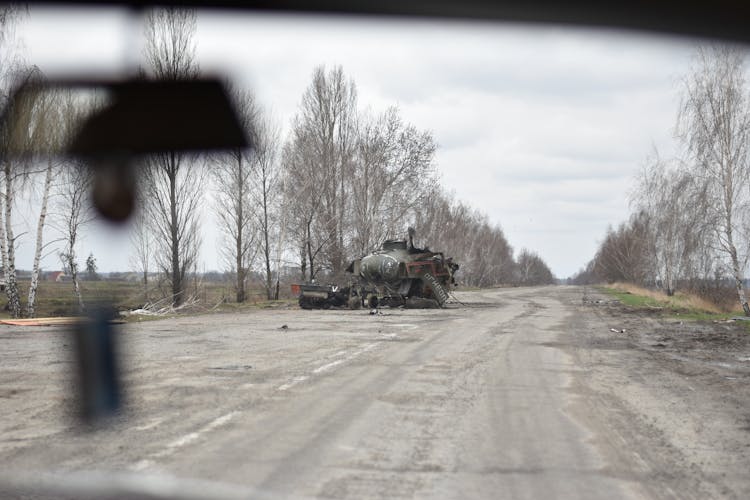 Destroyed Military Truck On Road