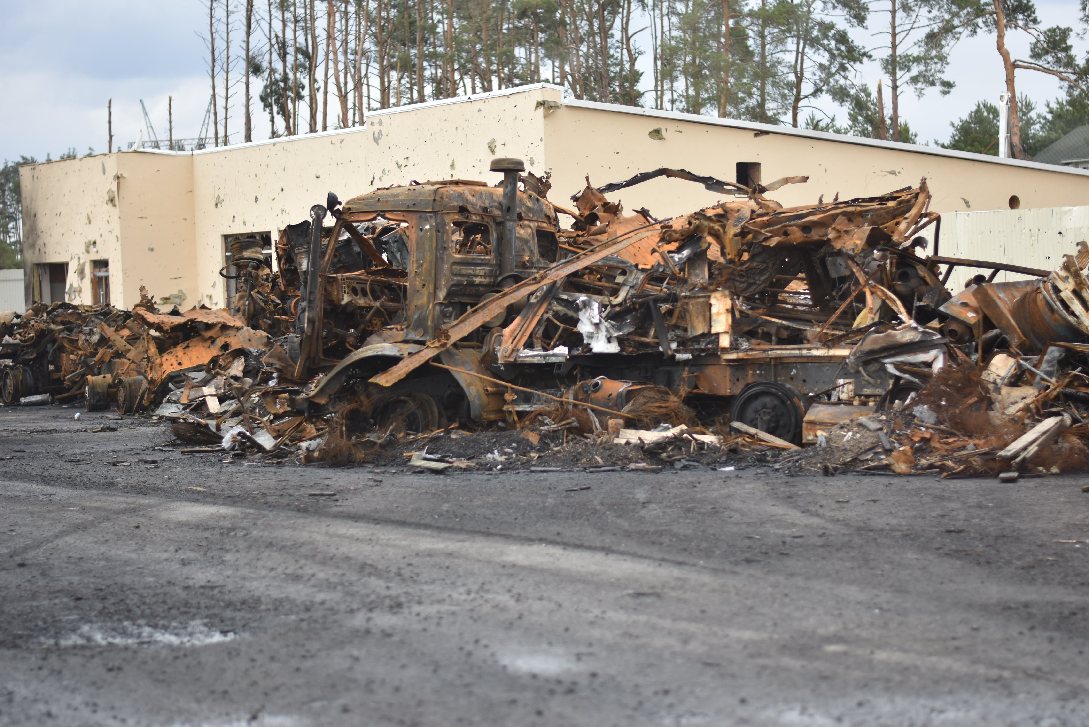 Destroyed Truck Near Road Free Stock Photo