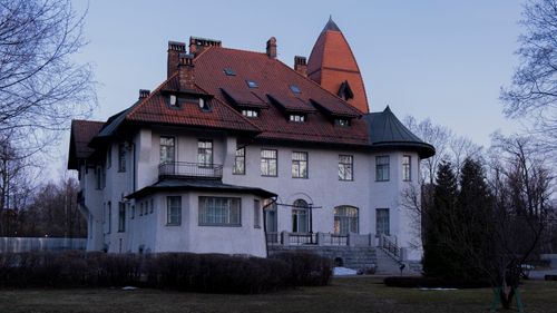 Free Elegant mansion with distinct red roof in St. Petersburg, Russia. Stock Photo