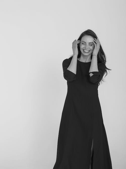 Free Woman in Black Long Sleeve Dress Stock Photo