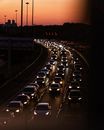 Fantastic traffic view on highway with twilight in the background.