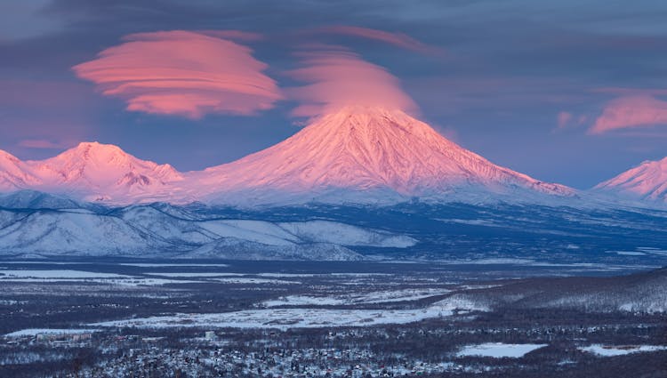 Kamchatka Volcanoes At Sunset 