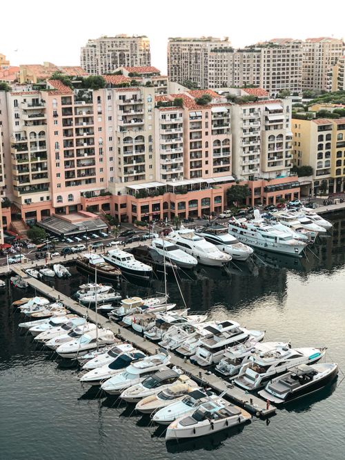 Free Explore the elegance of Monaco's harbor with luxury yachts and coastal architecture captured beautifully. Stock Photo