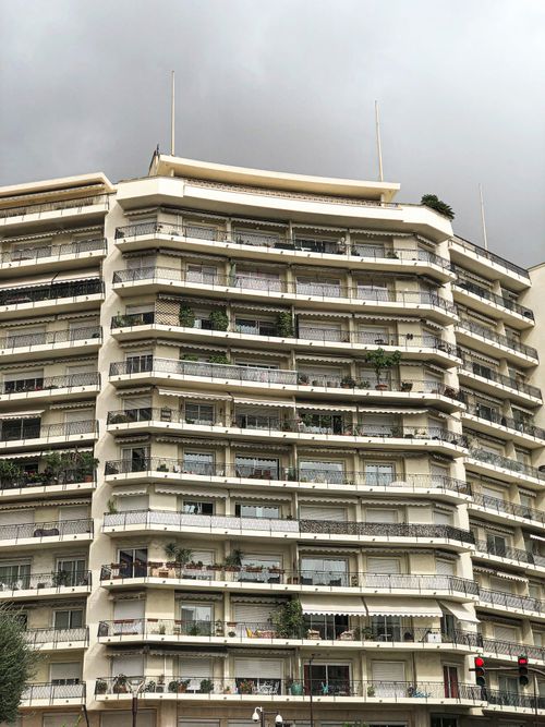 Free A concrete apartment building with balconies in Monaco, showcasing modern architecture. Stock Photo