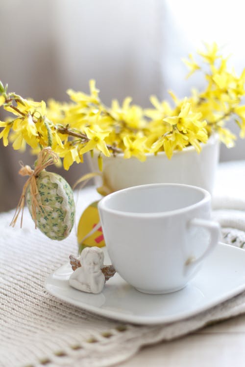 Free Blooming Yellow Flowers on White Ceramic Mug Stock Photo