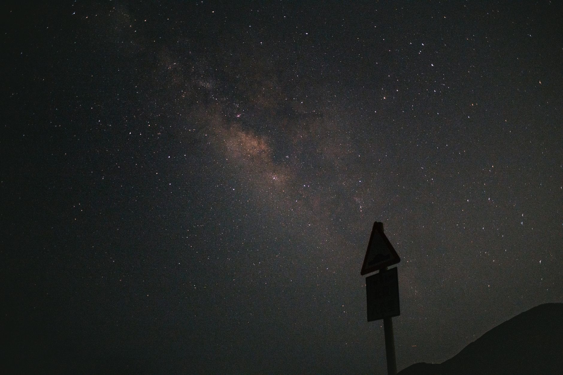 A mesmerizing view of the Milky Way galaxy under a dark, starry night sky.