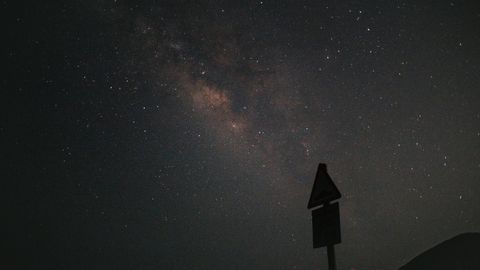 A mesmerizing view of the Milky Way galaxy under a dark, starry night sky.