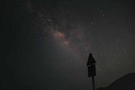 A mesmerizing view of the Milky Way galaxy under a dark, starry night sky., free online jigsaw puzzle on JigsawPuzzlesFreeOnline.org